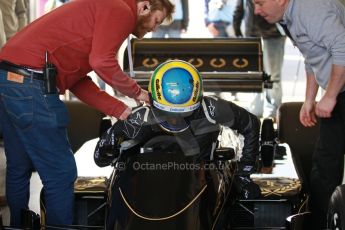 World © Octane Photographic Ltd. Senna Formula 1 car showcase filmed by Sky F1 at Donington Park race track. Tuesday 8th April 2014. Bruno Senna gets into his uncle's Lotus 98T. Digital Ref : 0904lb1d0087
