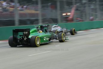 World © Octane Photographic Ltd. Friday 19th September 2014, Singapore Grand Prix, Marina Bay. - Formula 1 Practice 1. McLaren Mercedes MP4/29 - Jenson Button and Caterham F1 Team CT05 – Marcus Ericsson. Digital Ref: