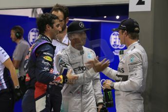 World © Octane Photographic Ltd. Saturday 20th September 2014, Singapore Grand Prix, Marina Bay. - Formula 1 Qualifying Parc Ferme. Mercedes AMG Petronas F1 W05 – Lewis Hamilton (pole) and Nico Rosberg (2nd) and in 3rd Infiniti Red Bull Racing RB10 – Daniel Ricciardo. Digital Ref: 1125LB1D2936