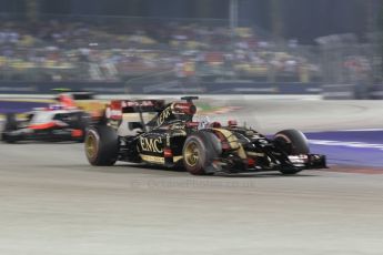 World © Octane Photographic Ltd. Saturday 20th September 2014, Singapore Grand Prix, Marina Bay. - Formula 1 Race outlap. Lotus F1 Team E22 - Romain Grosjean and Marussia F1 Team MR03 – Max Chilton. Digital Ref: 1127CB1D1032