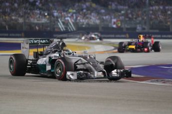 World © Octane Photographic Ltd. Sunday 21st September 2014, Singapore Grand Prix, Marina Bay. - Formula 1 Race. Mercedes AMG Petronas F1 W05 – Lewis Hamilton and Infiniti Red Bull Racing RB10 - Sebastian Vettel. Digital Ref: