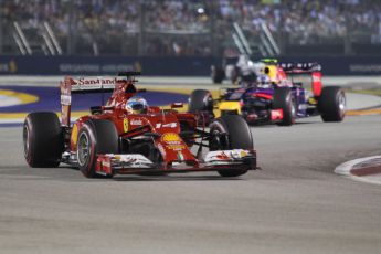 World © Octane Photographic Ltd. Sunday 21st September 2014, Singapore Grand Prix, Marina Bay. - Formula 1 Race. Scuderia Ferrari F14T - Fernando Alonso and Infiniti Red Bull Racing RB10 – Daniel Ricciardo. Digital Ref: