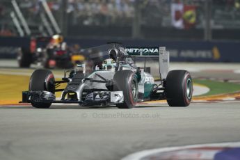 World © Octane Photographic Ltd. Sunday 21st September 2014, Singapore Grand Prix, Marina Bay. - Formula 1 Race. Mercedes AMG Petronas F1 W05 – Lewis Hamilton and Infiniti Red Bull Racing RB10 - Sebastian Vettel. Digital Ref: