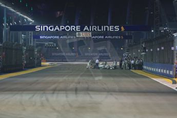 World © Octane Photographic Ltd. Sunday 21st September 2014, Singapore Grand Prix, Marina Bay. - Formula 1 Race formation lap gets underway as Nico Rosberg's Mercedes AMG Petronas F1 W05 is wheeled off the grid. Digital Ref: 1127LB1D3189