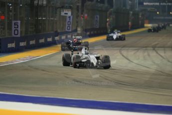 World © Octane Photographic Ltd. Saturday 20th September 2014, Singapore Grand Prix, Marina Bay. - Formula 1 Race. The Williams Martini Racing FW36 of Felipe Massa leads the McLaren Mercedes MP4/29 of Jenson Button with Valtteri Bottas' Williams behind. Digital Ref: 1127LB1D3312