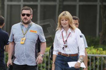 World © Octane Photographic Ltd. Saturday 20th September 2014, Singapore Grand Prix, Marina Bay. - Formula 1 Paddock. Louise Goodman (Singapore GPTV) and Paul Hembery - Pirelli. Digital Ref: 1122CB1D8293