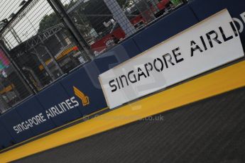 World © Octane Photographic Ltd. Wednesday 17th September 2014, Singapore Grand Prix, Marina Bay. Formula 1 Setup and atmosphere. New Singapore Airlines sponsorship being applied. Digital Ref: 1115CB1D6496