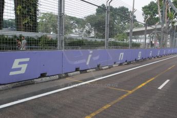 World © Octane Photographic Ltd. Wednesday 17th September 2014, Singapore Grand Prix, Marina Bay. Formula 1 Setup and atmosphere. Singapore trackside sign-writing. Digital Ref: 1115CB1D6512