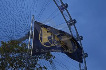 World © Octane Photographic Ltd. Wednesday 17th September 2014, Singapore Grand Prix, Marina Bay. Formula 1 Setup and atmosphere. FIA flag at night. Digital Ref: 1115CB6699