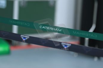 World © Octane Photographic Ltd. Wednesday 17th September 2014, Singapore Grand Prix, Marina Bay. Formula 1 Setup and atmosphere. Caterham F1 Team and Marussia F1 team pit barriers. Digital Ref: 1115LB1D8720