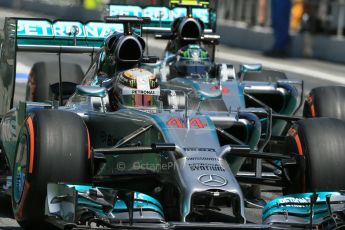 World © Octane Photographic Ltd. Friday 9th May 2014. Circuit de Catalunya - Spain - Formula 1 Practice 2 pitlane. Mercedes AMG Petronas F1 W05 Hybrid - Lewis Hamilton and Nico Rosberg. Digital Ref: