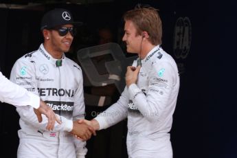 World © Octane Photographic Ltd. Saturday 10th May 2014. Circuit de Catalunya - Spain - Formula 1 Qualifying. Mercedes AMG Petronas F1 W05 Hybrid - Nico Rosberg shaking hands with teammate Lewis Hamilton. Digital Ref: 0936cb7d9982