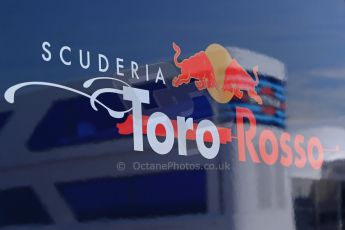 World © Octane Photographic Ltd. Thursday 8th May 2014. Circuit de Catalunya - Spain - Formula 1 Paddock. Scuderia Toro Rosso logo with reflection of Williams Martini Racing logo. Digital Ref: 0922lb1d2852