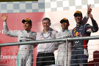 World © Octane Photographic Ltd. Sunday 2nd November 2014, F1 USA GP, Austin, Texas, Circuit of the Americas (COTA) - Podium. Mercedes AMG Petronas F1 W05 Hybrid – Lewis Hamilton, Nico Rosberg and  Infiniti Red Bull Racing RB10 – Daniel Ricciardo. Digital Ref: 1152LW1L4487