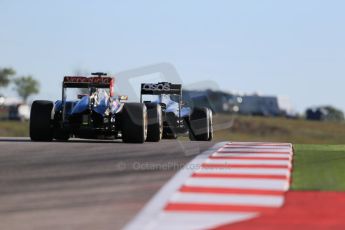 World © Octane Photographic Ltd. Friday 31st October 2014, F1 USA GP, Austin, Texas, Circuit of the Americas (COTA) - Practice 1. McLaren Mercedes MP4/29 – Kevin Magnussen and Lotus F1 Team E22 – Pastor Maldonado. Digital Ref: 1144LB1D7623