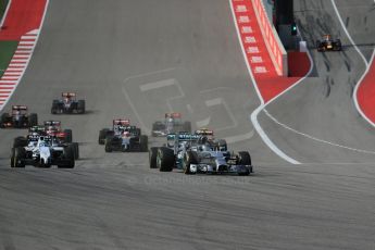 World © Octane Photographic Ltd. Sunday 2nd November 2014, F1 USA GP, Austin, Texas, Circuit of the Americas (COTA) - Race. Mercedes AMG Petronas F1 W05 Hybrid - Nico Rosberg leads the start of the USA GP. Digital Ref: 1151LB1D1227