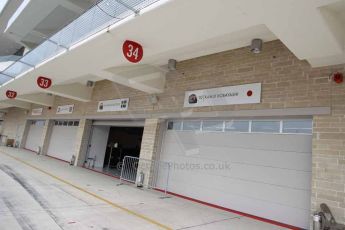 World © Octane Photographic Ltd. F1 USA GP, Austin, Texas, Circuit of the Americas (COTA). Wednesday 30th October 2014 – Pitlane setup. Empty Caterham garage. Digital Ref : 1141LB1D3403