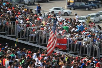 World © Octane Photographic Ltd. Sunday 2nd November 2014, F1 USA GP, Austin, Texas, Circuit of the Americas (COTA) - Paddock & Atmosphere. American flag being flown by fan. Digital Ref: 1150LB1D0997