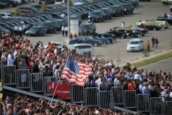 World © Octane Photographic Ltd. Sunday 2nd November 2014, F1 USA GP, Austin, Texas, Circuit of the Americas (COTA) - Paddock & Atmosphere. American flag being flown by fan. Digital Ref: 1150LB1D1020