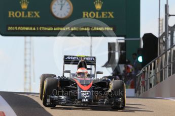 World © Octane Photographic Ltd. McLaren Honda MP4/30 - Jenson Button. Friday 27th November 2015, F1 Abu Dhabi Grand Prix, Practice 1, Yas Marina. Digital Ref: 1477CB1L5045