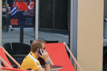 World © Octane Photographic Ltd. Renault personnel on the phone. Thursday 26th November 2015, F1 Abu Dhabi Grand Prix, Setup, Yas Marina. Digital Ref: 1472CB7D1292