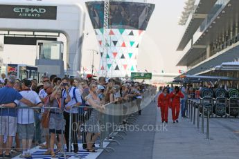 World © Octane Photographic Ltd. Fans in the pit lane to meet drivers. Thursday 26th November 2015, F1 Abu Dhabi Grand Prix, Setup, Yas Marina. Digital Ref: 1472CB7D1309