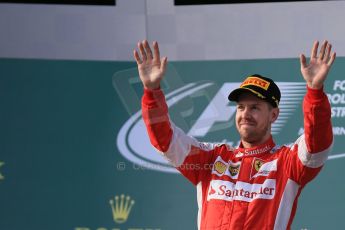 World © Octane Photographic Ltd. Scuderia Ferrari SF15-T– Sebastian Vettel (3rd). Sunday 15th March 2015, F1 Australian GP Podium, Melbourne, Albert Park, Australia. Digital Ref: 1210LB1D0150