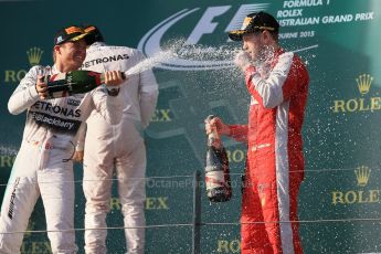 World © Octane Photographic Ltd. Mercedes AMG Petronas F1 W06 Hybrid – Lewis Hamilton (1st), Nico Rosberg (2nd) and Scuderia Ferrari SF15-T– Sebastian Vettel (3rd). Sunday 15th March 2015, F1 Australian GP Podium, Melbourne, Albert Park, Australia. Digital Ref: 1210LB1D0425