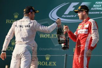 World © Octane Photographic Ltd. Mercedes AMG Petronas F1 W06 Hybrid – Nico Rosberg (2nd) and Scuderia Ferrari SF15-T– Sebastian Vettel (3rd). Sunday 15th March 2015, F1 Australian GP Podium, Melbourne, Albert Park, Australia. Digital Ref: 1210LB1D0562