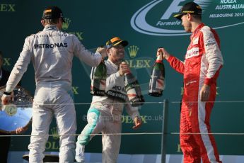 World © Octane Photographic Ltd. Mercedes AMG Petronas F1 W06 Hybrid – Lewis Hamilton (1st), Nico Rosberg (2nd) and Scuderia Ferrari SF15-T– Sebastian Vettel (3rd). Sunday 15th March 2015, F1 Australian GP Podium, Melbourne, Albert Park, Australia. Digital Ref: 1210LB1D0567