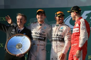 World © Octane Photographic Ltd. Mercedes AMG Petronas F1 W06 Hybrid – Lewis Hamilton (1st), Nico Rosberg (2nd) and Scuderia Ferrari SF15-T– Sebastian Vettel (3rd). Sunday 15th March 2015, F1 Australian GP Podium, Melbourne, Albert Park, Australia. Digital Ref: 1210LB1D0615
