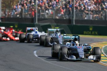 World © Octane Photographic Ltd. Into the 1st corner, Mercedes AMG Petronas F1 W06 Hybrid – Lewis Hamilton leads Nico Rosberg ahead of Williams Martini Racing FW37 – Felipe Massa and the 2 Ferraris of Vettel and Raikkonen. Sunday . Sunday 15th March 2015, F1 Australian GP Race, Melbourne, Albert Park, Australia. Digital Ref: 1209LB1D9317