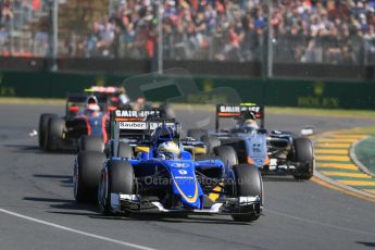 World © Octane Photographic Ltd. Sauber F1 Team C34-Ferrari – Marcus Ericsson, Sahara Force India VJM08 – Sergio Perez and McLaren Honda MP4/30 - Jenson Button. Sunday 15th March 2015, F1 Australian GP Race, Melbourne, Albert Park, Australia. Digital Ref: 1209LB1D9346
