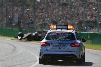 World © Octane Photographic Ltd. Lotus F1 Team E23 Hybrid – Pastor Maldonado and Mercedes AMG C63 Estate Medical Car. Sunday 15th March 2015, F1 Australian GP Race, Melbourne, Albert Park, Australia. Digital Ref: 1209LB1D9384