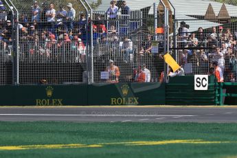 World © Octane Photographic Ltd. Yellow flag and safety Car board after Maldonado's Lotus crash. Sunday 15th March 2015, F1 Australian GP Race, Melbourne, Albert Park, Australia. Digital Ref: 1209LB1D9470