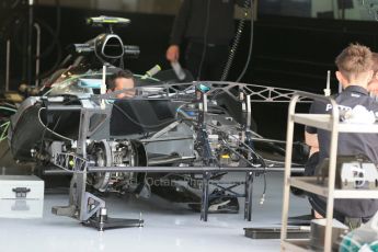 World © Octane Photographic Ltd. Mercedes AMG Petronas F1 W06 Hybrid setting up front suspension. Thursday 18th June 2015, F1 Austrian GP Paddock, Red Bull Ring, Spielberg, Austria. Digital Ref: 1302LB1D4572