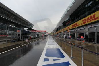 World © Octane Photographic Ltd. Wet pitlane. Thursday 18th June 2015, F1 Austrian GP Paddock, Red Bull Ring, Spielberg, Austria. Digital Ref: 1302LW1L2471