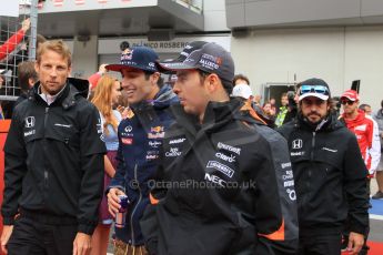 World © Octane Photographic Ltd. McLaren Honda MP4/30 - Jenson Button, Infiniti Red Bull Racing RB11 – Daniel Ricciardo and Sahara Force India VJM08 – Sergio Perez. Sunday 21st June 2015, F1 Austrian GP Grid, Red Bull Ring, Spielberg, Austria. Digital Ref: 1318LW1L3913