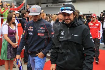 World © Octane Photographic Ltd. McLaren Honda MP4/30 – Fernando Alonso and Scuderia Toro Rosso STR10 – Carlos Sainz Jnr. Sunday 21st June 2015, F1 Austrian GP Grid, Red Bull Ring, Spielberg, Austria. Digital Ref: 1318LW1L3924