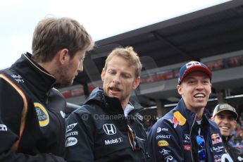 World © Octane Photographic Ltd. Lotus F1 Team E23 Hybrid – Romain Grosjean, McLaren Honda MP4/30 - Jenson Button, Infiniti Red Bull Racing RB11 – Daniil Kvyat and Pastor Maldonado. Sunday 21st June 2015, F1 Austrian GP Grid, Red Bull Ring, Spielberg, Austria. Digital Ref: 1318LW1L3946