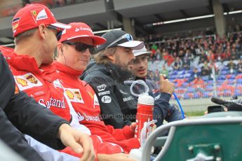 World © Octane Photographic Ltd. Kimi Raikkonen, Scuderia Ferrari SF15-T– Sebastian Vettel, McLaren Honda MP4/30 – Fernando Alonso and Scuderia Toro Rosso STR10 – Carlos Sainz Jnr. Sunday 21st June 2015, F1 Austrian GP Grid, Red Bull Ring, Spielberg, Austria. Digital Ref: 1318LW1L3959