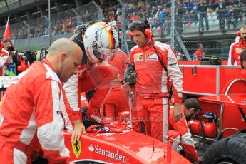 World © Octane Photographic Ltd. Scuderia Ferrari SF15-T– Sebastian Vettel. Sunday 21st June 2015, F1 Austrian GP Grid, Red Bull Ring, Spielberg, Austria. Digital Ref: 1318LW1L4030