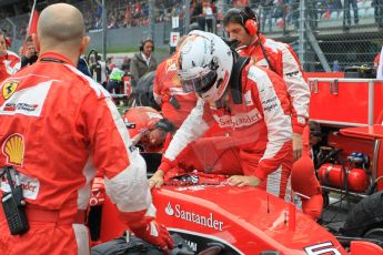 World © Octane Photographic Ltd. Scuderia Ferrari SF15-T– Sebastian Vettel. Sunday 21st June 2015, F1 Austrian GP Grid, Red Bull Ring, Spielberg, Austria. Digital Ref: 1318LW1L4036