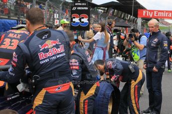 World © Octane Photographic Ltd. Scuderia Toro Rosso STR10 – Max Verstappen is watched over by Helmut Marko. Sunday 21st June 2015, F1 Austrian GP Grid, Red Bull Ring, Spielberg, Austria. Digital Ref: 1318LW1L4051