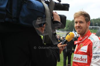 World © Octane Photographic Ltd. Scuderia Ferrari SF15-T– Sebastian Vettel. Sunday 21st June 2015, F1 Austrian GP Grid, Red Bull Ring, Spielberg, Austria. Digital Ref: 1318LW1L4057