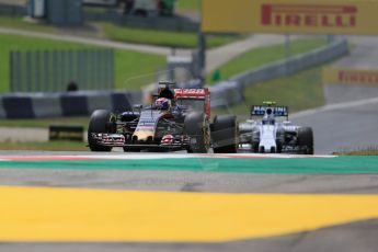 World © Octane Photographic Ltd. Scuderia Toro Rosso STR10 – Max Verstappen and Williams Martini Racing FW37 – Valtteri Bottas. Friday 19th June 2015, F1 Austrian GP Practice 1, Red Bull Ring, Spielberg, Austria. Digital Ref: 1304LB1D5080