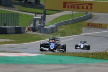 World © Octane Photographic Ltd. Sauber F1 Team C34-Ferrari – Felipe Nasr and Williams Martini Racing FW37 – Valtteri Bottas. Friday 19th June 2015, F1 Austrian GP Practice 1 Red Bull Ring, Spielberg, Austria. Digital Ref: 1304LB1D5275