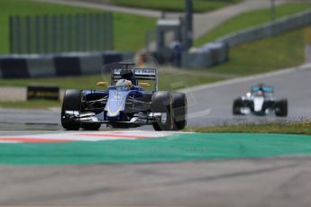 World © Octane Photographic Ltd. Sauber F1 Team C34-Ferrari – Marcus Ericsson and Mercedes AMG Petronas F1 W06 Hybrid – Lewis Hamilton. Friday 19th June 2015, F1 Austrian GP Practice 1, Red Bull Ring, Spielberg, Austria. Digital Ref: 1304LB1D5339