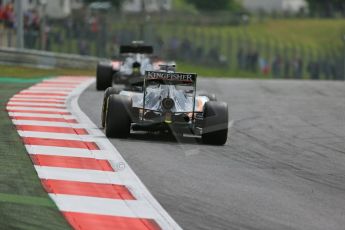 World © Octane Photographic Ltd. McLaren Honda MP4/30 - Jenson Button and Sahara Force India VJM08 – Nico Hulkenberg. . Friday 19th June 2015, F1 Austrian GP Practice 1, Red Bull Ring, Spielberg, Austria. Digital Ref: 1304LB1D5370