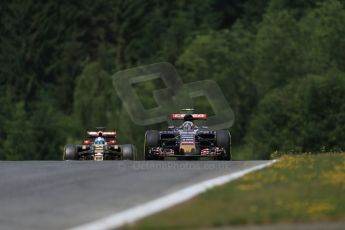 World © Octane Photographic Ltd. Scuderia Toro Rosso STR10 – Carlos Sainz Jnr and Lotus F1 Team E23 Hybrid Reserve Driver – Jolyon Palmer. Friday 19th June 2015, F1 Austrian GP Practice 1, Red Bull Ring, Spielberg, Austria. Digital Ref: 1304LB1D5755